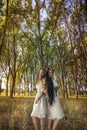 Pagan Girls in the forest by the tree Royalty Free Stock Photo