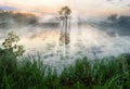 Morning. a picturesque foggy dawn by the river. Sun rays Royalty Free Stock Photo