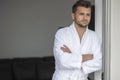 Morning portrait of handsome young man in bathrobe Royalty Free Stock Photo