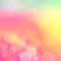 Morning rainbow clouds watercolor background with painted sunset sky colors of pink yellow and green with bokeh lights