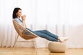 Girl having rest at home with a cup of hot tea Royalty Free Stock Photo