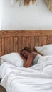 Morning rest lazy sunday woman sleeping in bed Royalty Free Stock Photo