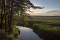 morning on the river with sunrise from the high bank