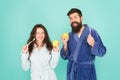 Morning routine. personal care and hygiene. Feeling happiness. couple in bathrobe clening teeth. man beard and girl