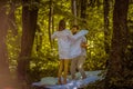 Morning routine but this time in nature. Young couple. Royalty Free Stock Photo
