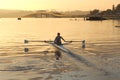 Morning rower and bridge Royalty Free Stock Photo