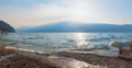 Morning scenery at the beach, tourist resort Gargnano, lake Garda, italy Royalty Free Stock Photo