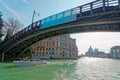 Morning scenery of Venice with view of a motor boat water taxi passing under Accademia bridge, Palace Cavalli-Franchetti Royalty Free Stock Photo