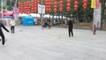 Shenzhen, China: elderly people play top as a fitness exercise in the morning sports square