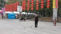 Shenzhen, China: elderly people play top as a fitness exercise in the morning sports square