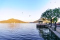 Morning shot of Fateh sagar lake with blue water and hills in th Royalty Free Stock Photo