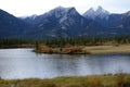 Morning shots of a blue lake against the backdrop of the Rocky Mountains in Alberta Royalty Free Stock Photo
