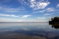 Morning sky with light clouds over the calm lake Uvildy Royalty Free Stock Photo