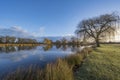 Morning sky reflection over pond Royalty Free Stock Photo