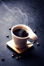 Morning small cup of coffee or espresso drink with steam aroma rising from the cup Royalty Free Stock Photo