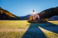 Morning in St. Magdalena village. Location place San Giovanni Church, Funes Valley, Dolomites