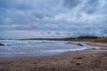 Morning storm clouds over beach on Caribbean Sea Royalty Free Stock Photo