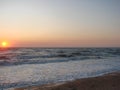 Natural picture of the rainbow colors of sunrise on the coast of the Azov Sea. Royalty Free Stock Photo
