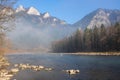 Morning sun and fog hovering over a Pieniny mountain and dunajec river Royalty Free Stock Photo