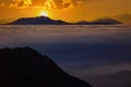 The morning sun and the orange sky above the mountains. Twilight sky background. Colorful Sunset sky and cloud. vivid sky in twili Royalty Free Stock Photo