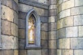 The morning sun penetrate through the beautiful stained-glass window of a stone castle or cathedral, selective focus Royalty Free Stock Photo