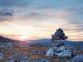 . Morning sun between sharp rocks, Alpine cliff above valley. Daybreak Sun Royalty Free Stock Photo