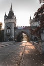 Morning sun shining through trees with warm glow and gate of Vajdahunyad castle in Budapest city park Royalty Free Stock Photo