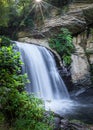 Morning sun twinkles above Looking glass falls in Pisgah Forest