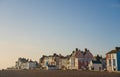 Morning light on coloured houses on the seafront in Aldeburgh, Suffolk. UK