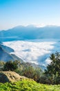 Morning sunrise, dramatic cloud of sea, giant rocks and Yushan mounatin under bright blue sky in AlishanAli mountain National Pa