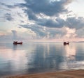 Morning sunrise light pink sky, blue sea, white clouds, two ships silhouette, sunset on ocean coast, beautiful seascape, Thailand Royalty Free Stock Photo