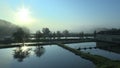 Morning sunrise and sunup with fog and reflection to the blue surface magical and beautiful water, low laithe trout, and
