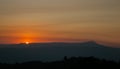 The morning of sunshine behind the Khao Yai national park mountain in the winter of Thailand. Asia sunrise view Royalty Free Stock Photo