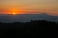 The morning of sunshine behind the Khao Yai national park mountain in the winter of Thailand. Asia sunrise view Royalty Free Stock Photo