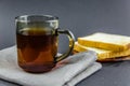 Morning tea and toast on a black background