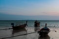 Morning time at Koh Lipe Fishing boat moored while the sun was rising Royalty Free Stock Photo