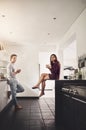Morning time is our quality time. a happy young couple enjoying a relaxing cup of coffee together in the kitchen. Royalty Free Stock Photo
