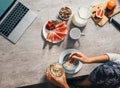 Morning time - woman prepare healthy breakfast Royalty Free Stock Photo