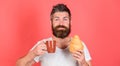 Morning tradition concept. But first coffee. Enjoy every sip of coffee. Bearded hipster enjoy breakfast drink coffee Royalty Free Stock Photo