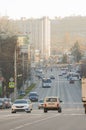 Morning traffic on broad road of city Avenue. Urban landscape Royalty Free Stock Photo