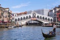 Morning traffic on Grand Canal under Rialto bridge Royalty Free Stock Photo