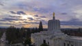 Morning Traffic Passes the Oregon Pioneer atop the Capital Building Salem