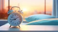 Morning vibes alarm clock and coffee cup on table with blurred background for text placement Royalty Free Stock Photo