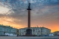 Alexander Column  at sunrise with dramatic sky in Palace Square in St Petersburg, Russia. Royalty Free Stock Photo