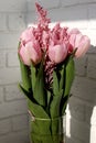 Bouquet of beautiful pink tulips in early spring as a postcard or picture with nice flowers Royalty Free Stock Photo