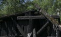 Morning view of a burnt down wooden house Royalty Free Stock Photo