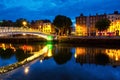 Morning view of famous illuminated Ha Penny Bridge in Dublin, Ireland Royalty Free Stock Photo
