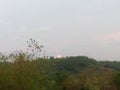 Long view from a valley. evening sky view from the top of a building. Royalty Free Stock Photo