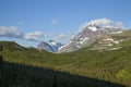 Morning view of Lone Walker and Rising Wolf mountains in Glacier National Park