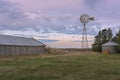 Barn, Windmill and Grain Bin on the Prairie Royalty Free Stock Photo